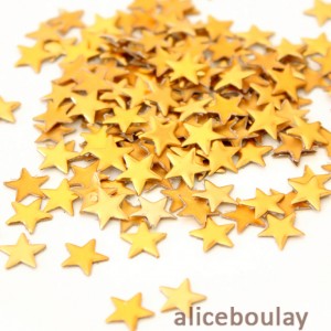 Mercerie 100 étoiles clous/strass thermocollant dorés 8mm 