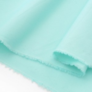 Tissu popeline coton épais extensible vert menthe x 50cm 