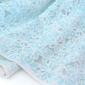 Tissu tulle dentelle polyester bleu blanc x 68cm
