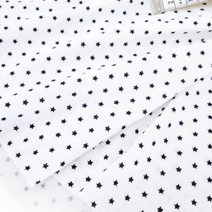 Destock 1.35m tissu jersey coton doux étoile noire fond blanc largeur 179cm
