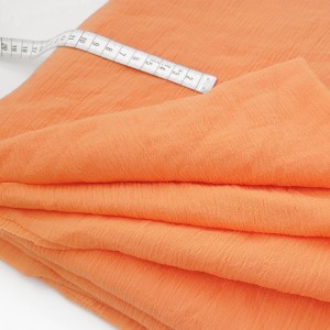 Destock 0.85m tissu crépon coton doux capucine largeur 125cm 