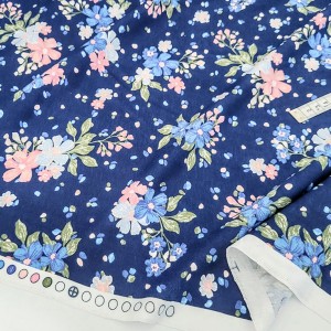http://aliceboulay.com/23529-56999-thickbox/destock-1m-tissu-jersey-coton-imprime-fleuri-fond-bleu-largeur-178cm.jpg