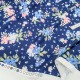Destock 1m tissu jersey coton imprimé fleuri fond bleu largeur 178cm