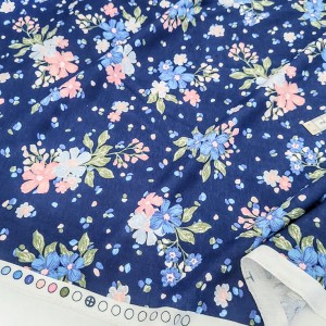 http://aliceboulay.com/23530-57001-thickbox/destock-175m-tissu-jersey-coton-imprime-fleuri-fond-bleu-largeur-178cm.jpg