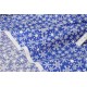 Tissu américain patchwork-Thème Noël-flocon de neige fond bleu x 50cm