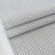 Tissu popeline coton petit motif géométrique noir fond écru x 50cm 
