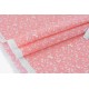 Tissu américain motif dentelle rose saumon fond écru x 50cm 