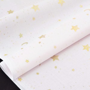 Tissu batiste de coton soyeux fluide étoiles dorées sur fond rose pale x 50cm 