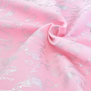 Tissu coton gabardine extensible doux bagues argentées sur fond rose x 50cm 