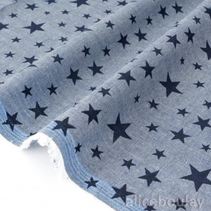 Tissu coton chambray motif étoiles noires fond gris x 50cm 