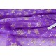 Tissu organza imprimé flocon de neige doré sur fond violet x 1mètre 