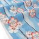 Tissu japonais toile coton souple fleuri fond bleu x50cm 