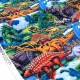 Tissu américain les dinosaures multicolore x 50cm 