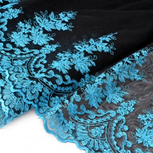 http://aliceboulay.com/8590-24522-thickbox/tissu-haute-couture-tulle-brode-broderie-festonnes-fluide-turquoise-noir-x-50cm.jpg