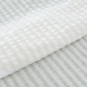 Tissu coton polyester gaufré beige blanc x 50cm