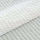 Tissu coton polyester gaufré beige blanc x 50cm
