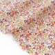 Tissu popeline coton soyeux fleuri sur fond baige x 50cm