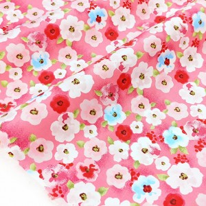 Tissu percale coton fleuri rose fond marine x 50cm