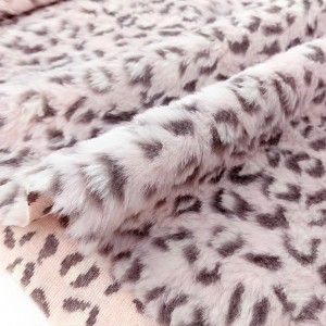 Destock 2m tissu fausse fourrure léopard rose largeur 170cm 