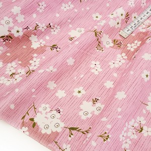 Destock 1.5m tissu coton souple fleur de cerisier fond rose largeur 162cm