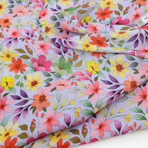 Destock 0.65m tissu mousseline polyester imitation soie imprimé fleuri largeur 150cm
