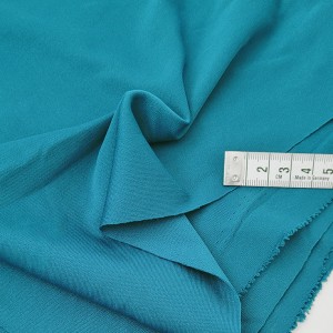 Destock coupon tissu jersey polyamide fluide pétrole 85*96cm