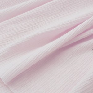 Destock 0.5m tissu crépon coton doux rose pâle largeur 116cm 