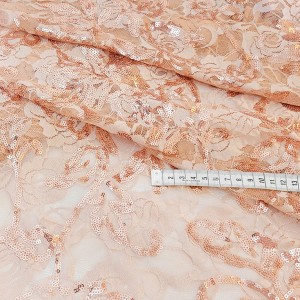 Destock 1.75m tissu dentelle élastique brodé sequins fluide haute couture rose doré largeur 150cm