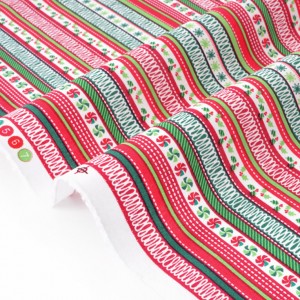 Tissu américain-Thème Noël-motif guirlande multicolore fond blanc x 50cm 