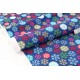 Tissu américain-Thème Noël-flocon de neige multicolore sur fond bleu x 50cm 