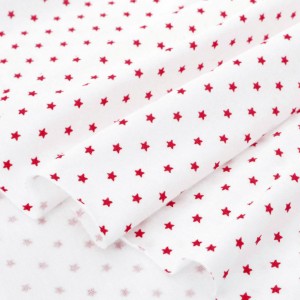 Tissu jersey coton doux étoiles rouges fond blanc x 50cm 